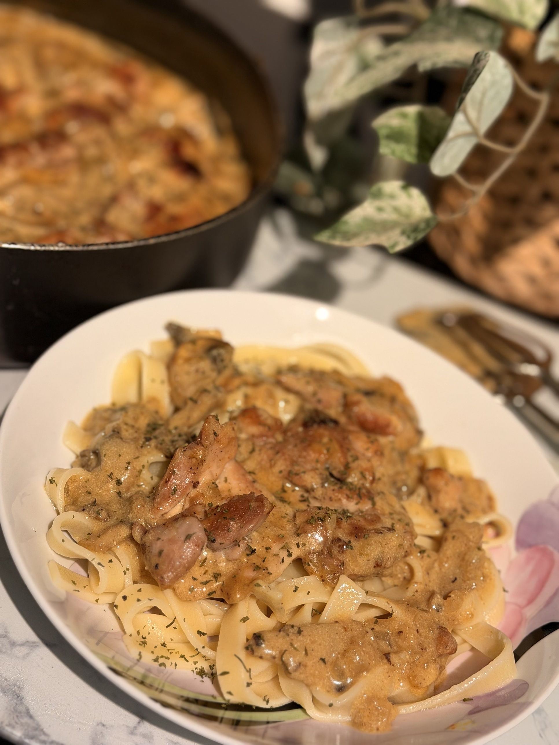 Creamy mushroom chicken served on a bed of tagliatelle